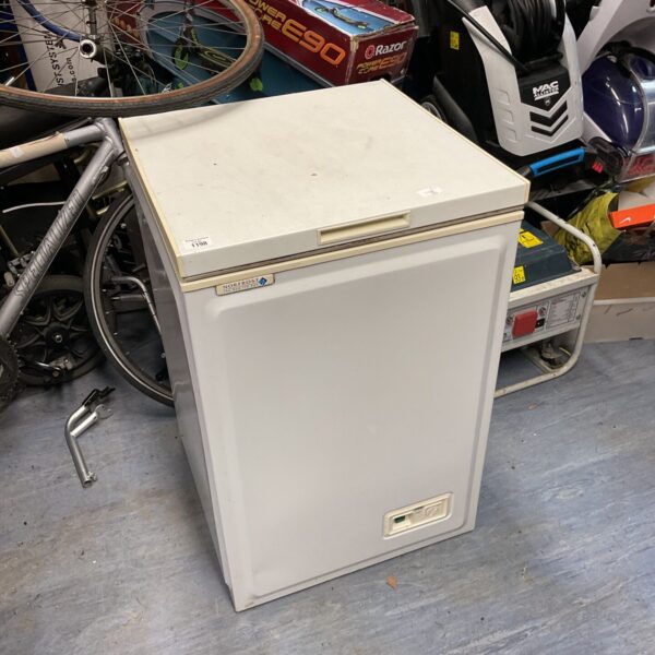 White Norfrost chest freezer for kitchen storage.