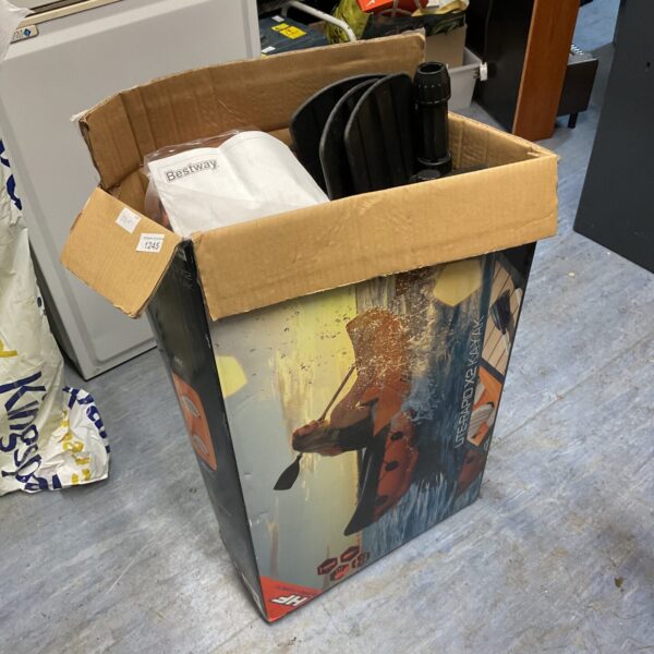 Lite Rapid kayak in its original packaging, ready for water adventures.