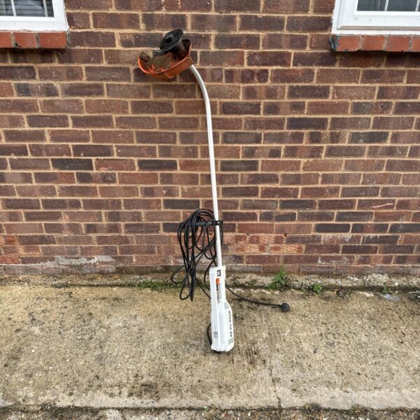 Stihl FE 55 corded electric strimmer for garden maintenance.