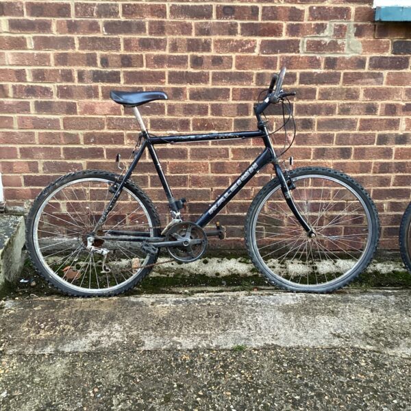 Vintage Raleigh mountain bike in used condition.