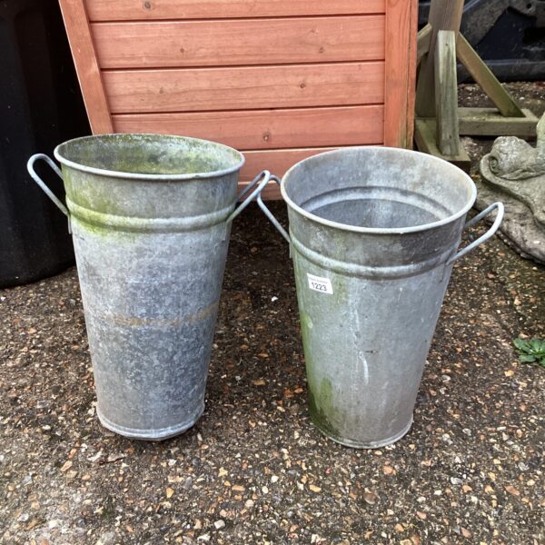 Pair of vintage galvanised garden buckets with wire handles.