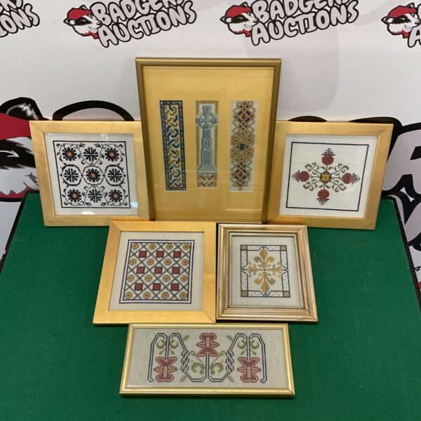 Lot of six antique gilt framed embroideries with floral designs.