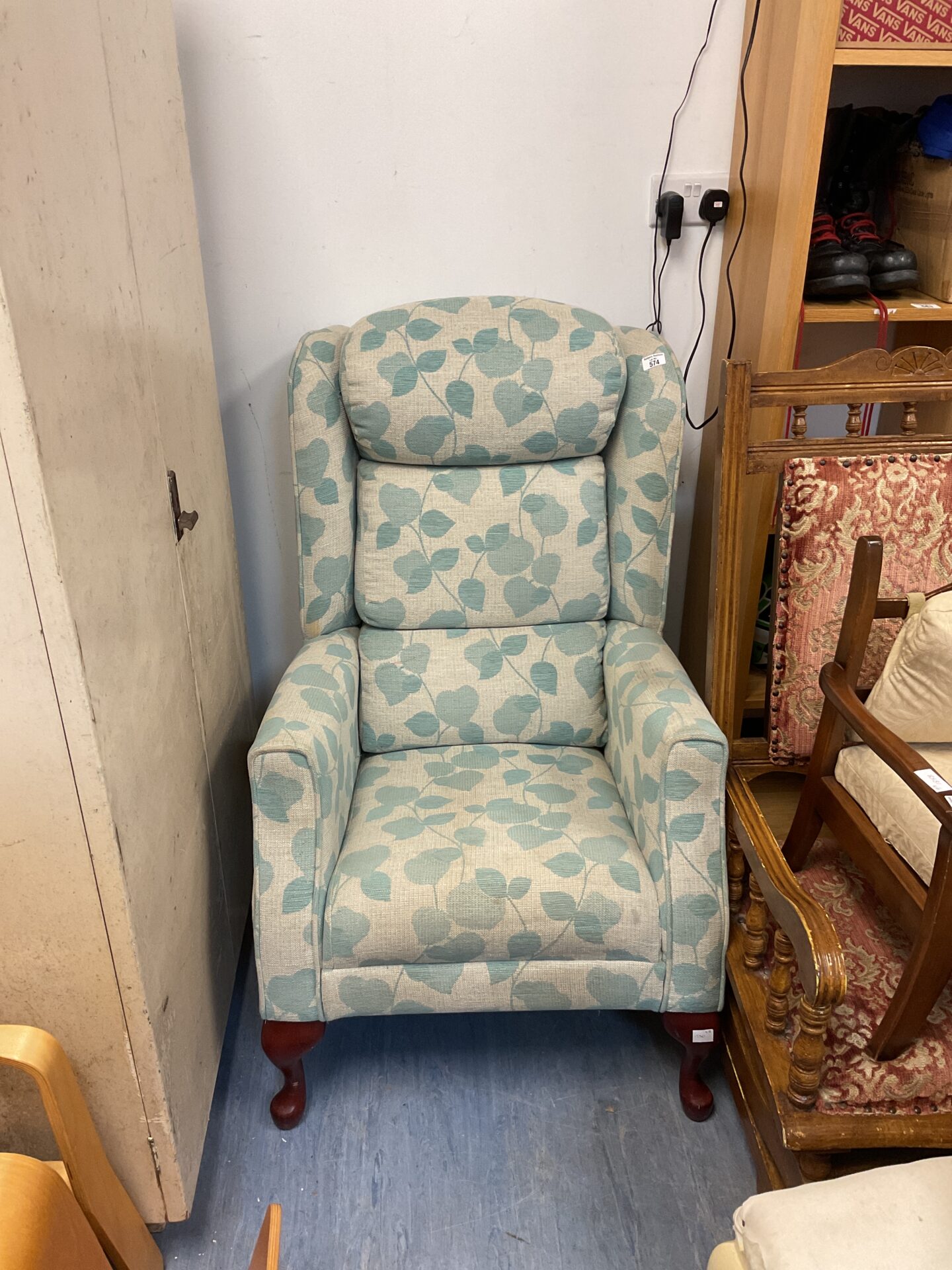 574 Leaf pattern upholstered armchair