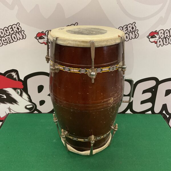 Front view of a traditional Jas dholak drum.