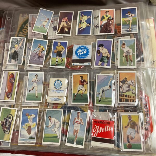 Overview of a vintage card album filled with collectible cards.
