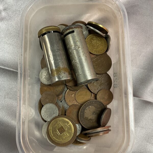 Mixed coin lot with vintage British coins and a small saving bank.