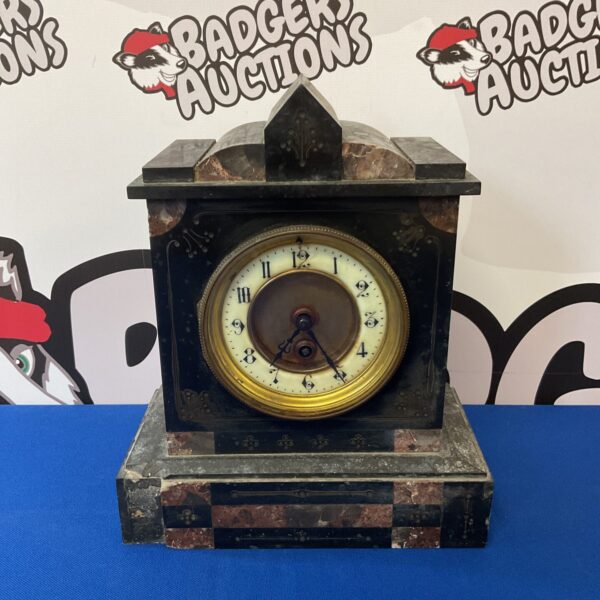 Antique Victorian mantle clock with slate and marble case.
