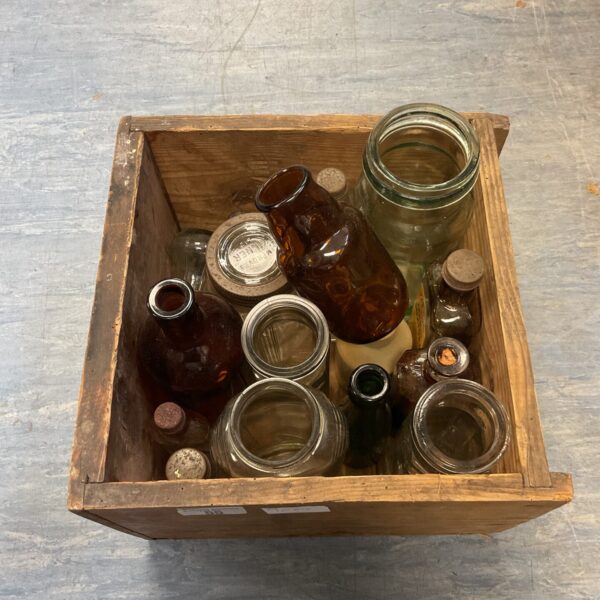 Mixed lot of vintage glass bottles and jars for collectors.