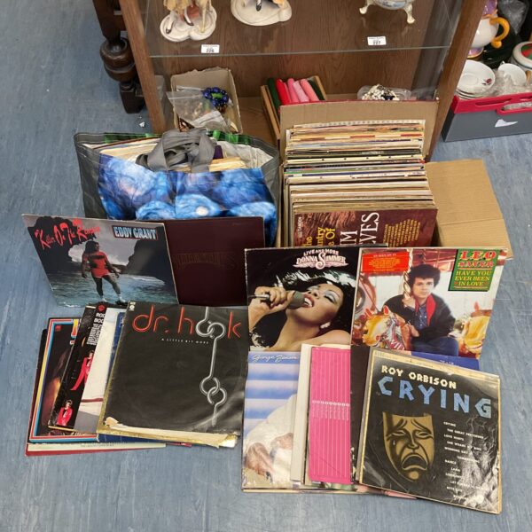 Assorted vinyl records including Donna Summer and Rod Stewart.