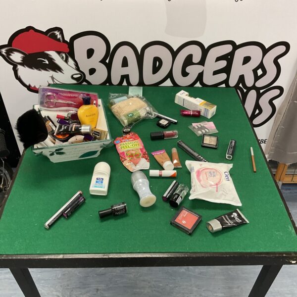 Mixed beauty and toiletries lot with various cosmetic products.
