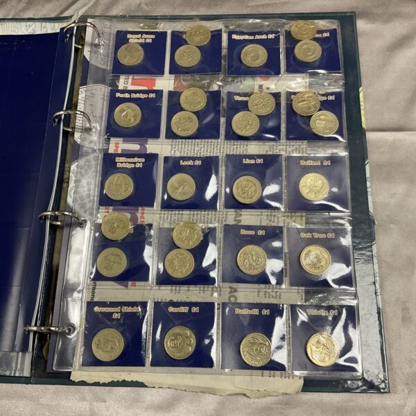 Front view of a Change Checker folder containing £1 coin collection.