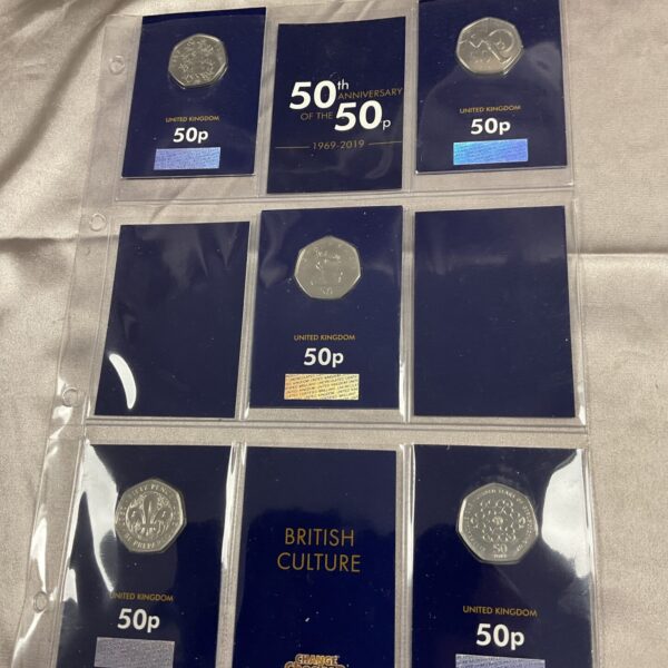 Uncirculated 50p coins, including the Kew Gardens design, in protective capsules.