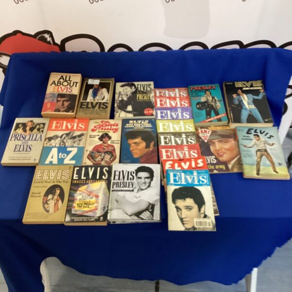 Vintage collection of Elvis Presley books for collectors and fans.