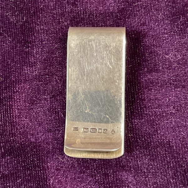 Hallmarked sterling silver money clip, classic design.