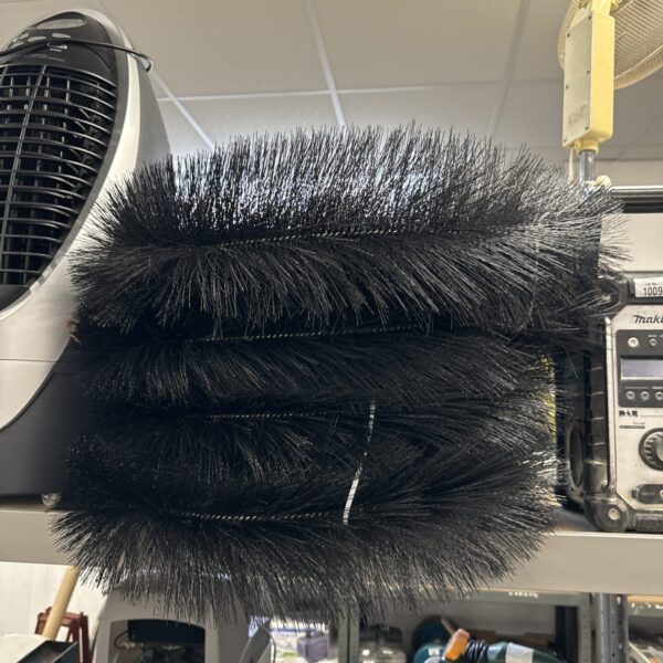 Roll of hedgehog gutter brush for effective gutter cleaning.