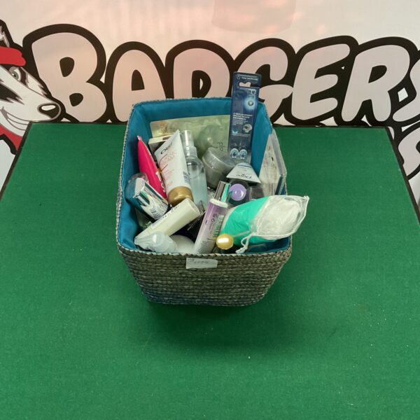 Mixed toiletries lot with various beauty and personal care products.