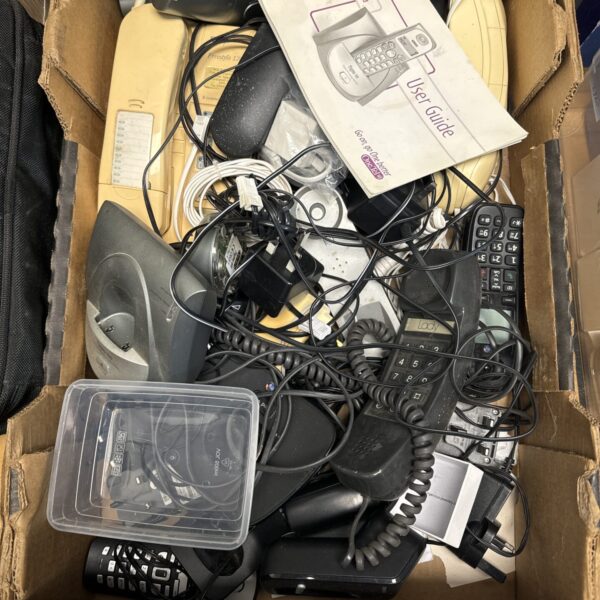 Mixed lot of vintage telephones and cables for collectors.