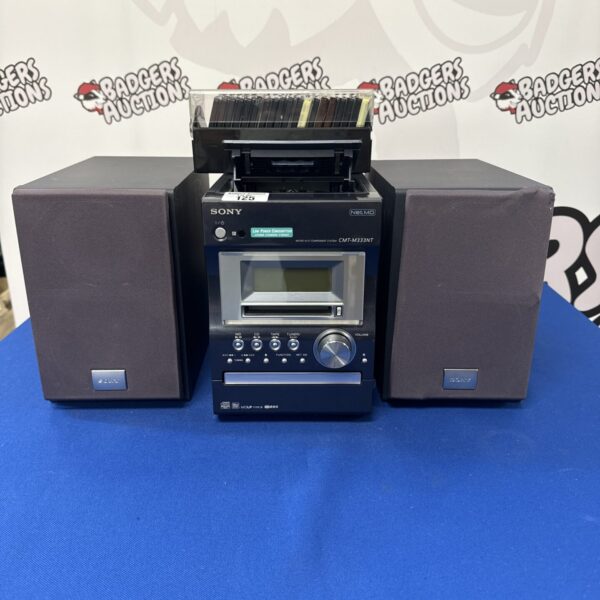 Sony CMT-M333NT minidisc hi-fi system with speakers and minidiscs.