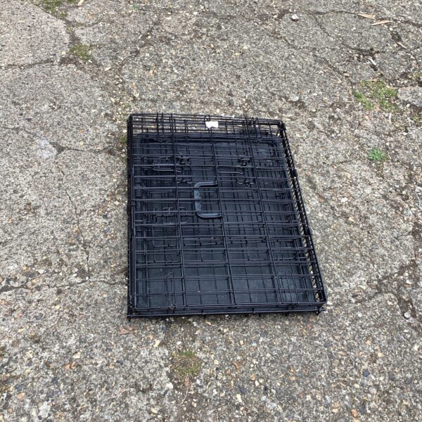 Black folding animal cage for small pets.