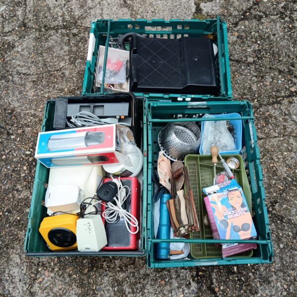 Vintage electronics lot with radio and cassette player.