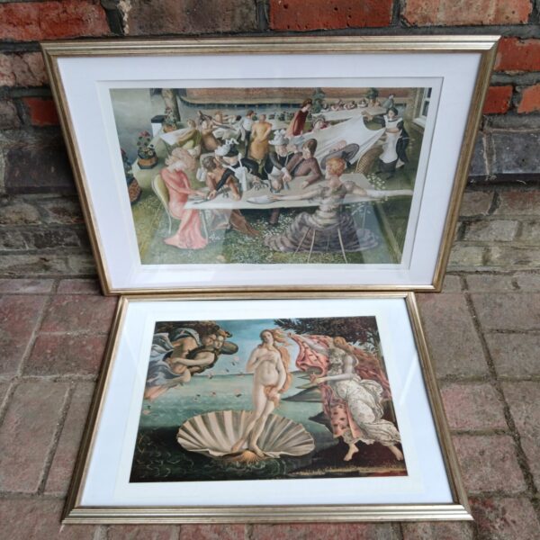 Framed print of Botticelli's "The Birth of Venus" artwork.