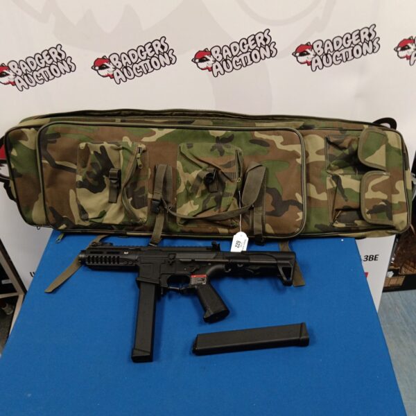 G&G Combat Machine airsoft rifle with carrying case.