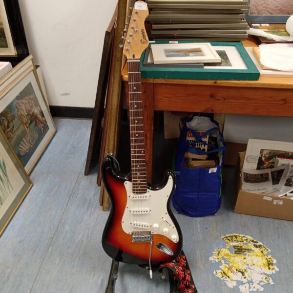 Encore sunburst electric guitar with a sunburst finish.