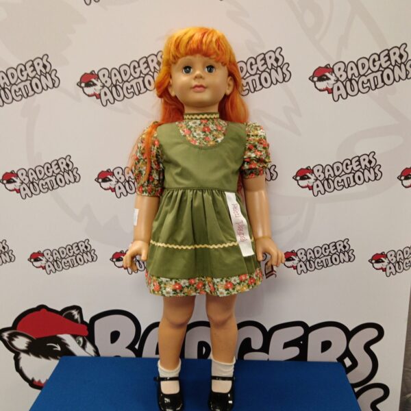 Vintage Patti Playpal doll with carrot top hairstyle.