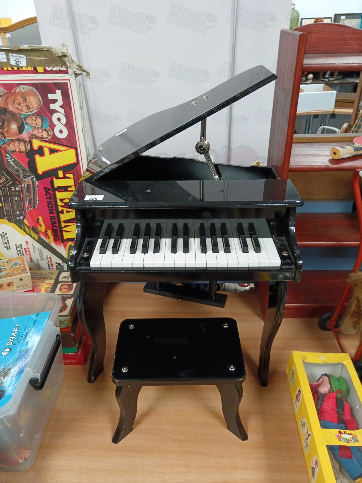 327 Child’s baby grand piano with stool