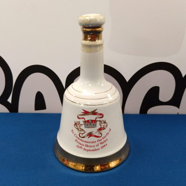 Sealed Prince Henry Bells Scotch Whiskey Bell decanter, collectible royal memorabilia.
