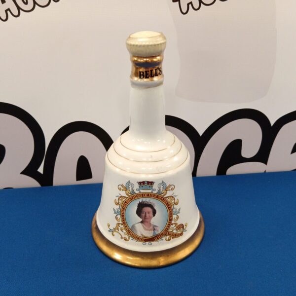 Queen Elizabeth II commemorative Bells Scotch Whiskey bottle, sealed.