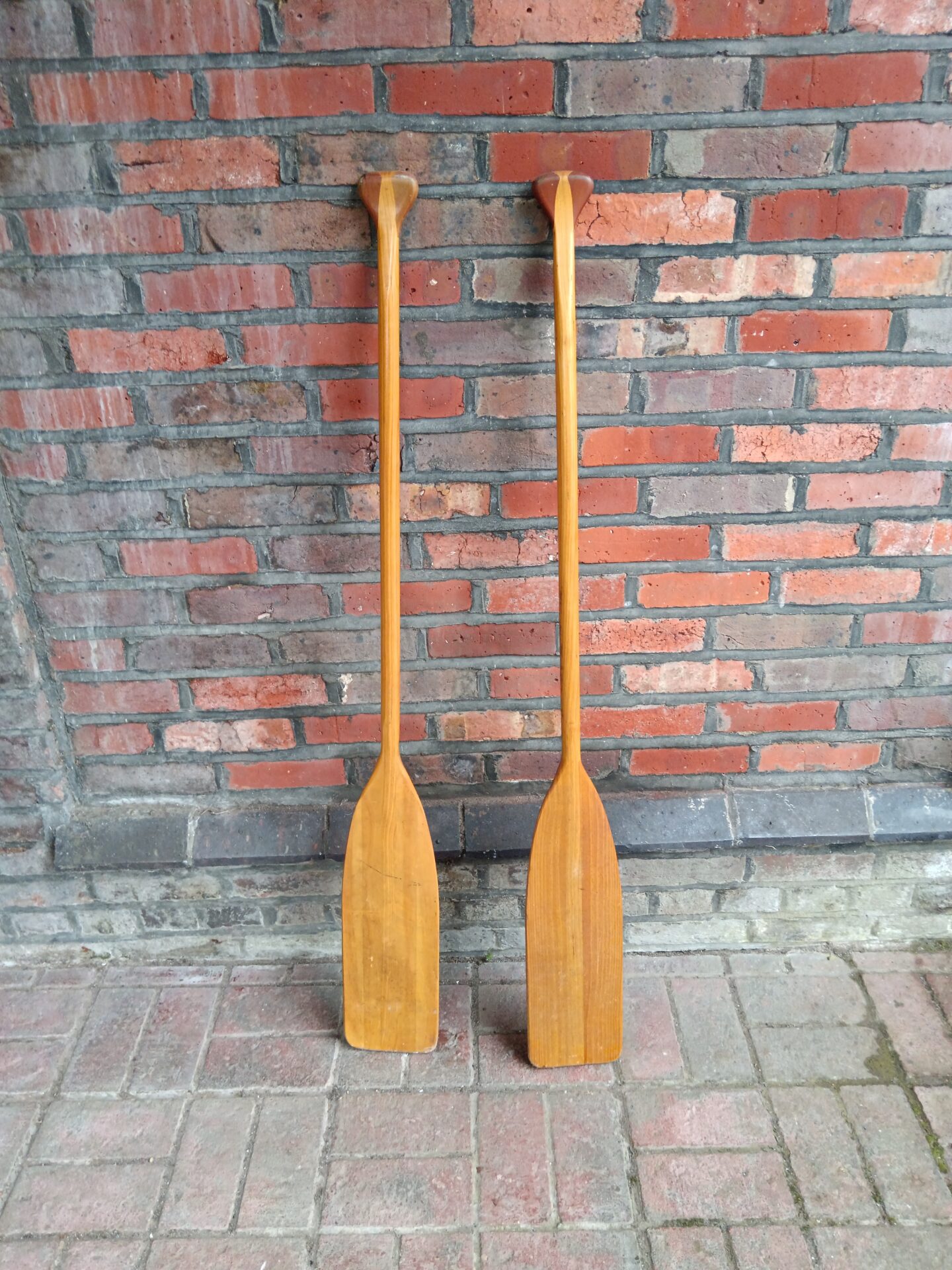 762 Two wooden canoe paddles