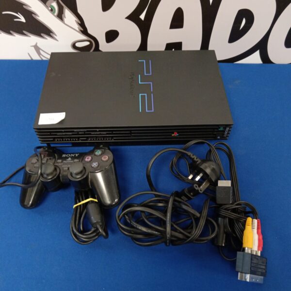 Sony Playstation 2 console with controller and cables for retro gaming.