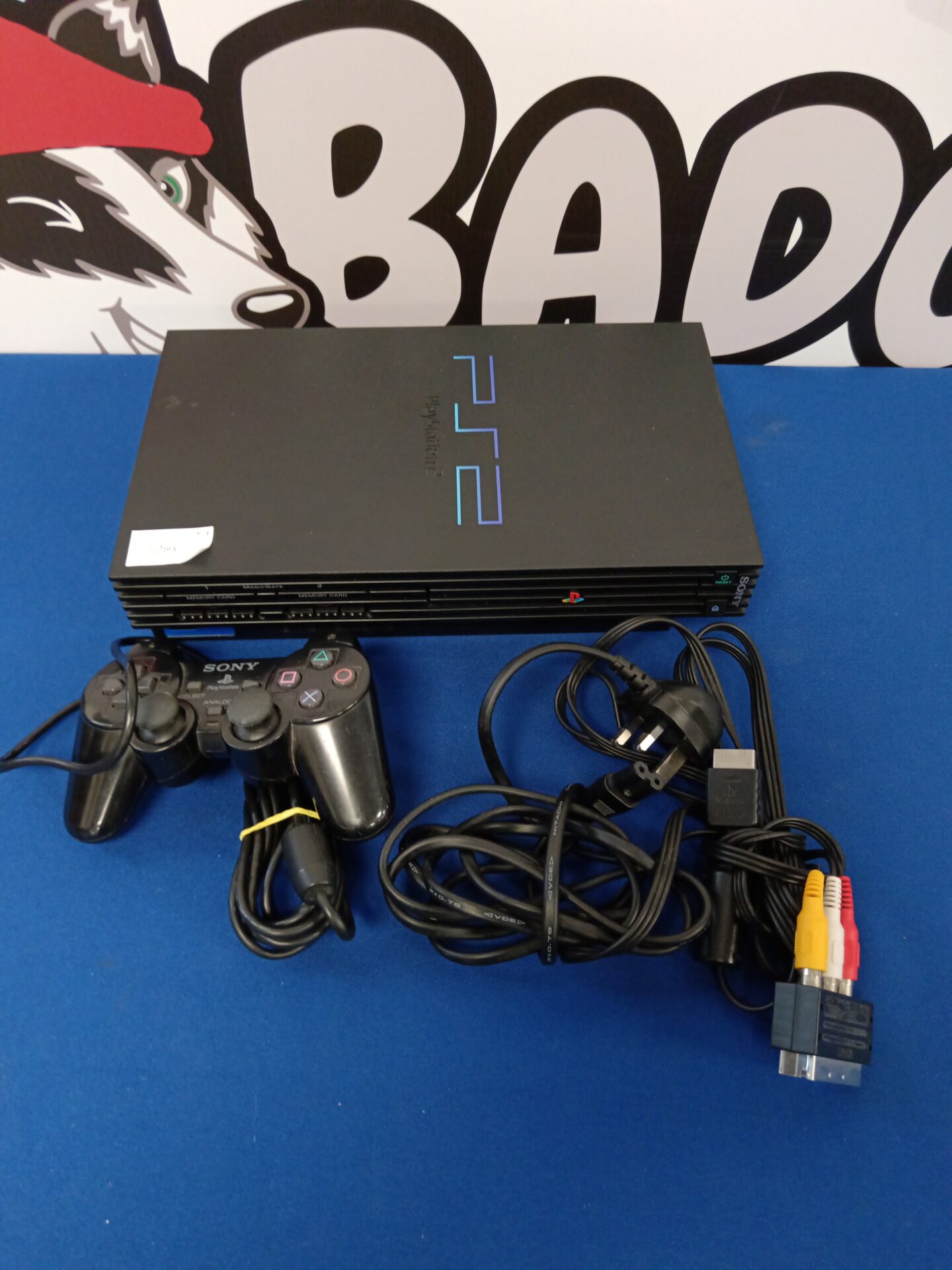 082 Sony playstation 2 console with controller and cables