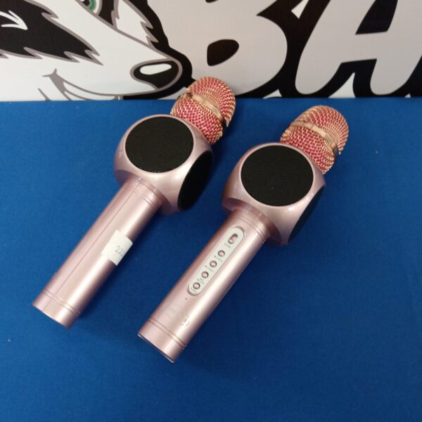 Rose gold Amicool karaoke microphones for portable entertainment.