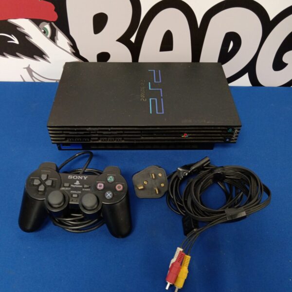 Sony Playstation 2 console with controller and cables for retro gaming.