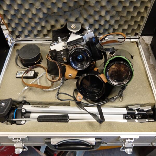 Vintage USSR Zenit camera kit with lenses and case.