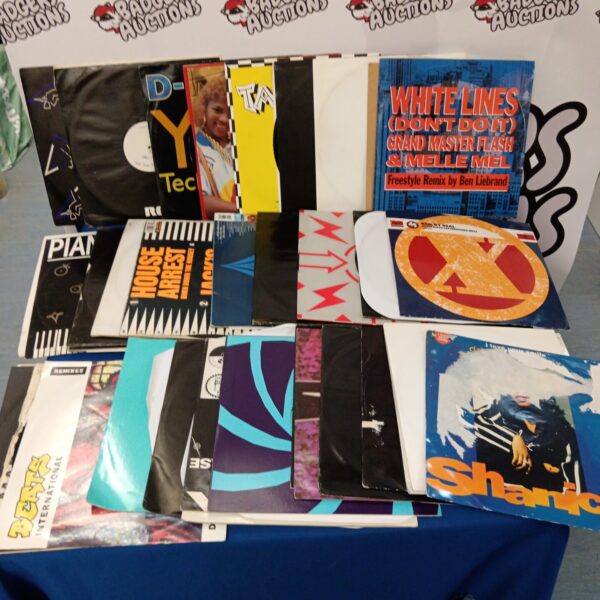 Mixed lot of approximately 50 dance music vinyl records.