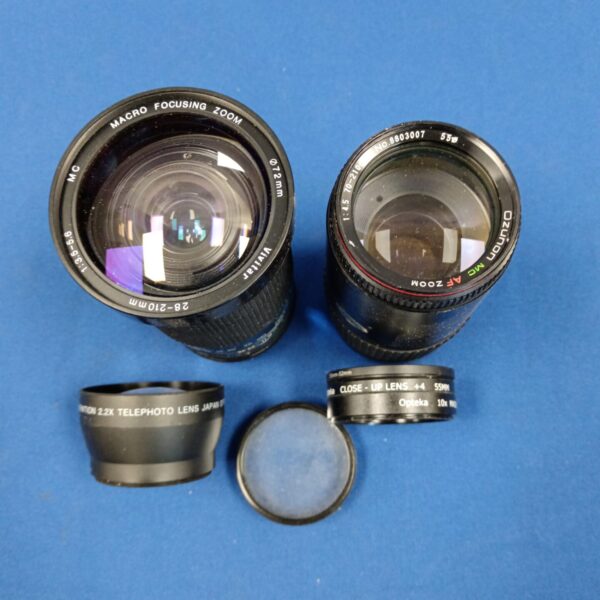 Vintage camera lenses including Fotga and 58mm macro lens.