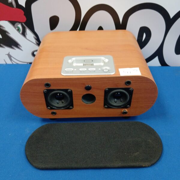 Cyber Sound iCube iPod docking speaker in wooden cabinet.