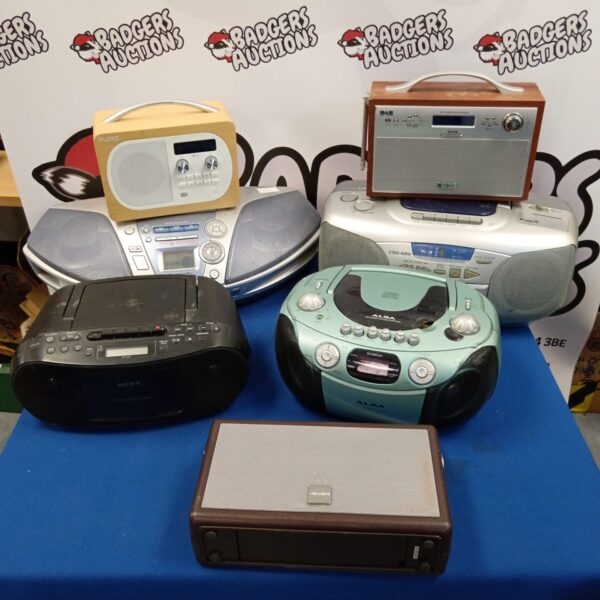 Vintage radio lot including Sony and Pure radios for collectors.