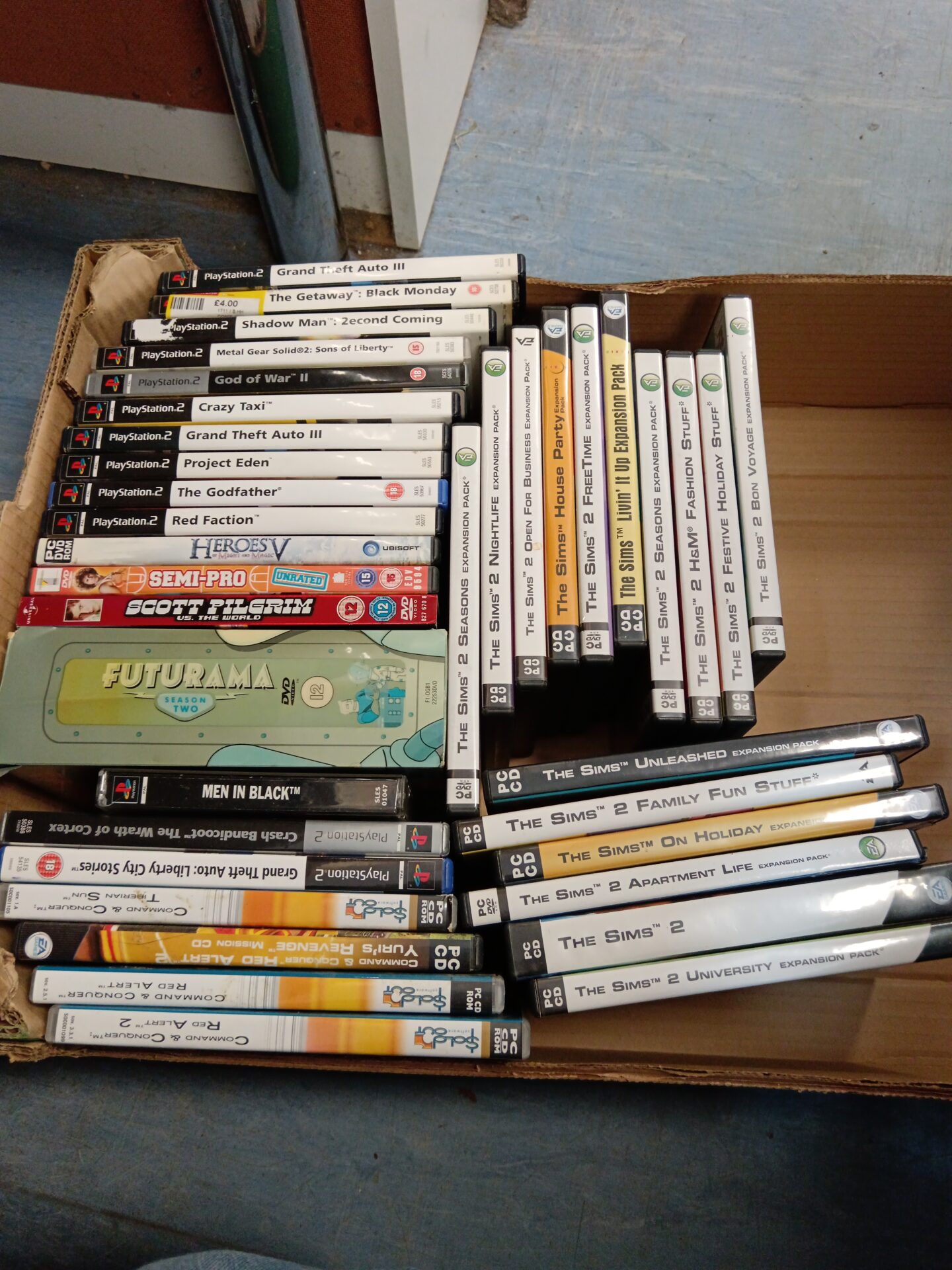 185 Tray of Sony playstation 2 games & pc games