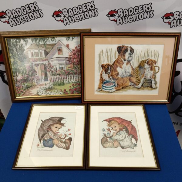 Vintage framed embroidery of a charming bulldog.