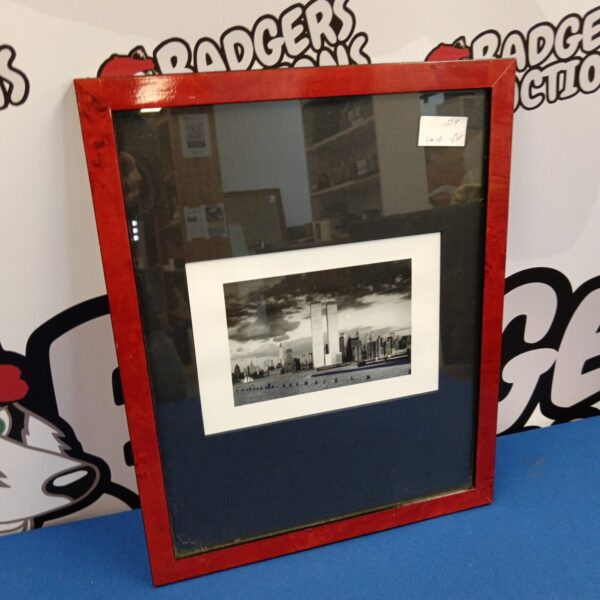 Framed black and white photograph of the New York skyline with the Twin Towers.