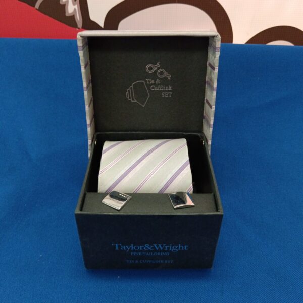 Taylor & Wright tie and cufflink set in a presentation box.