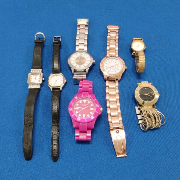 Selection of ladies' fashion watches with varied straps and faces.