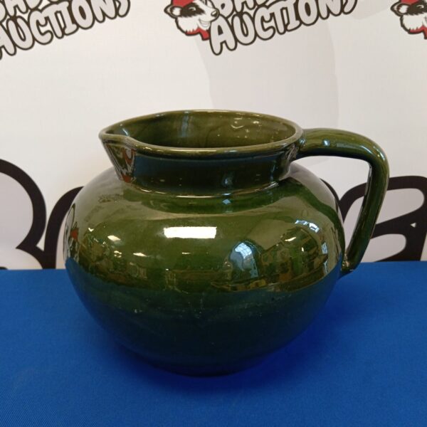 Large green Brannum Barnum Devon pottery jug for collectors.