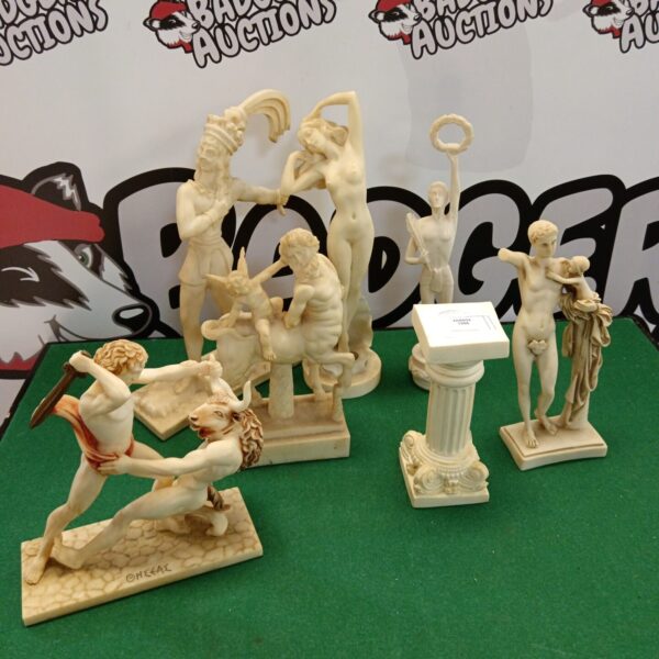 Antique alabaster Greek gods collection, detailed mythological sculptures.