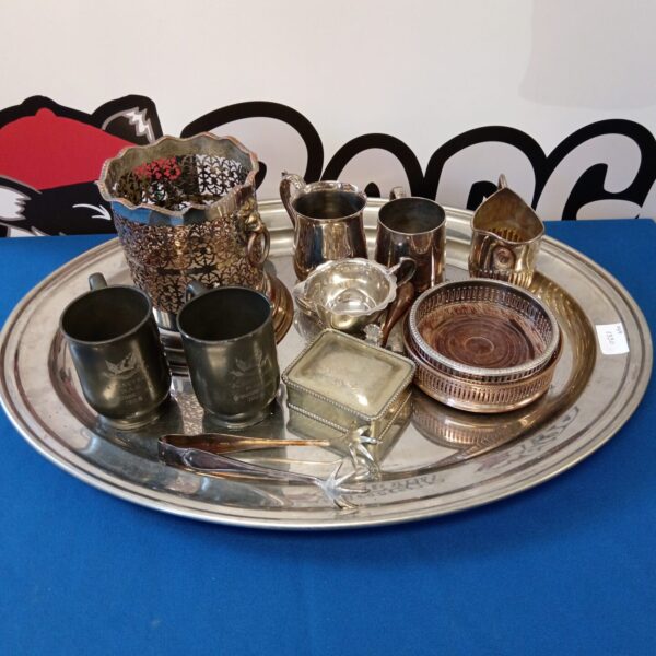 Vintage silver plate and pewter collection with tankards and tray.
