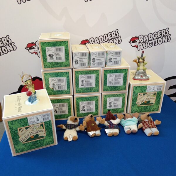 Boxed Pocket Dragons and Wombles soft toys, vintage collectible figures.